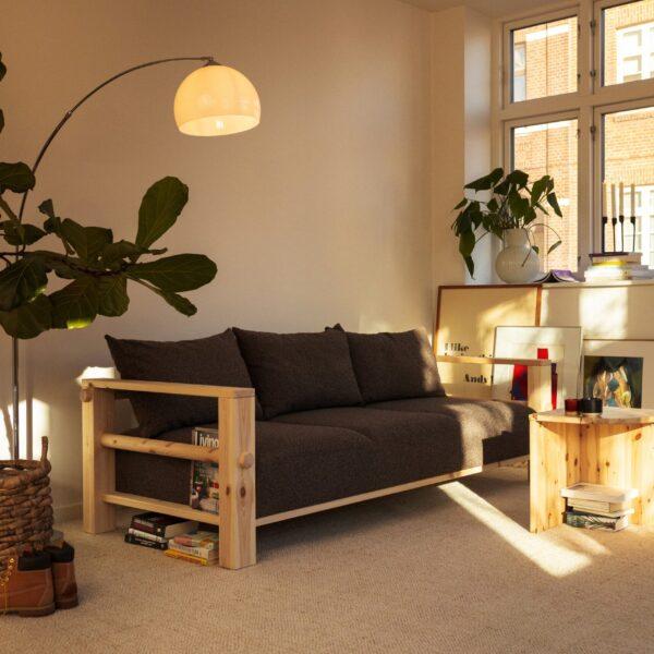 Tapicerowana nowoczesna sofa BARE z funkcją spania